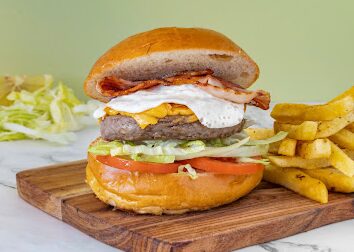 Bacon and egg burger with chips